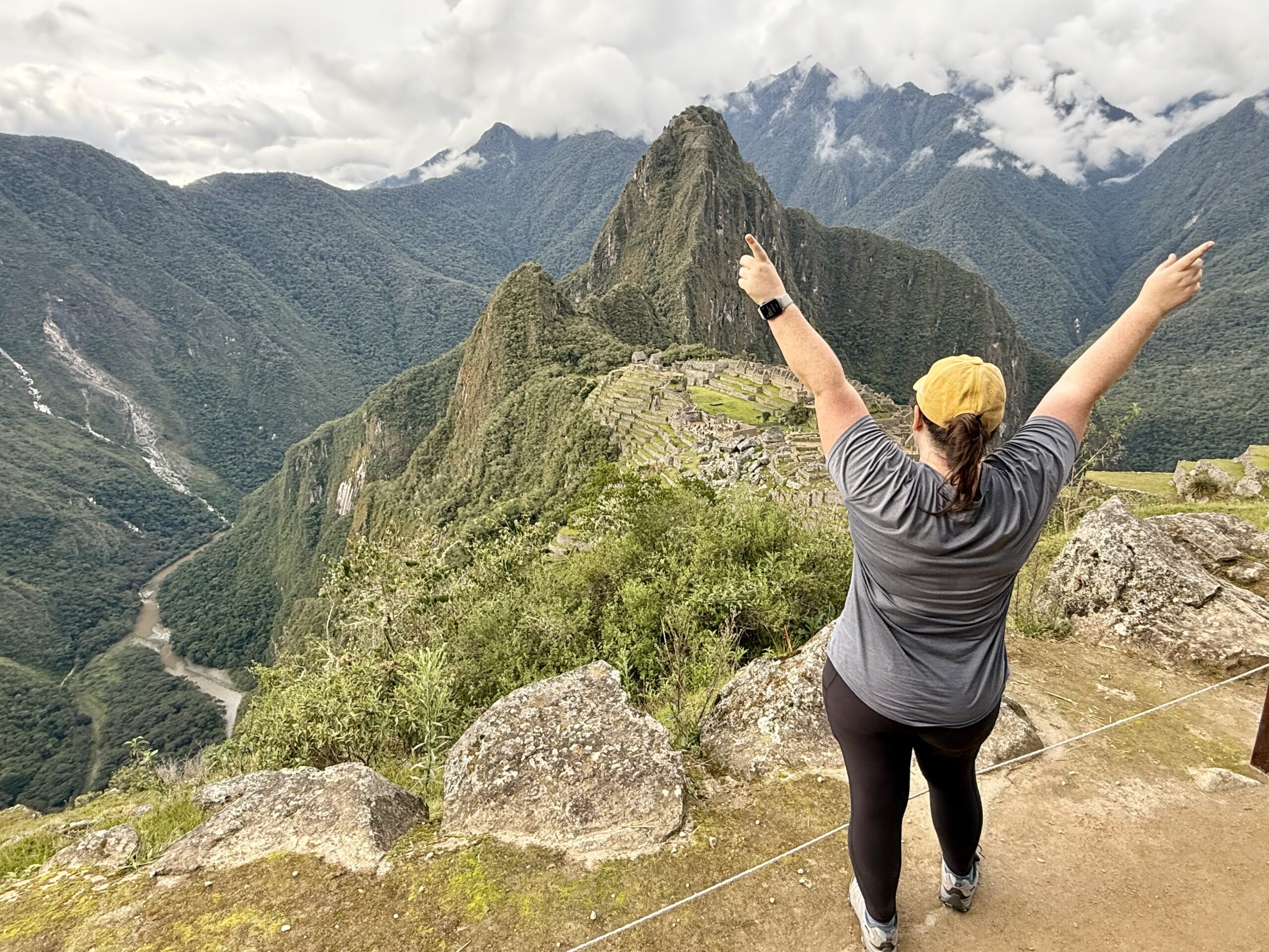 Girl standing at Machu Picchu.